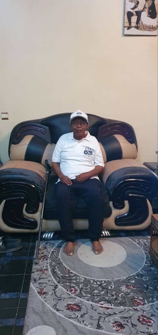 Shimelis with souvenirs